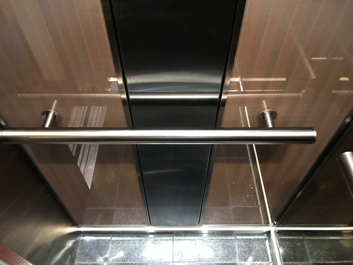 A view of the inside of an elevator.