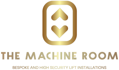 A gold logo that says machine room and has an arrow in the middle.
